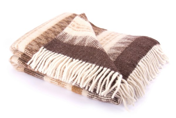 Plaid chaud : alliez confort et élégance chez vous